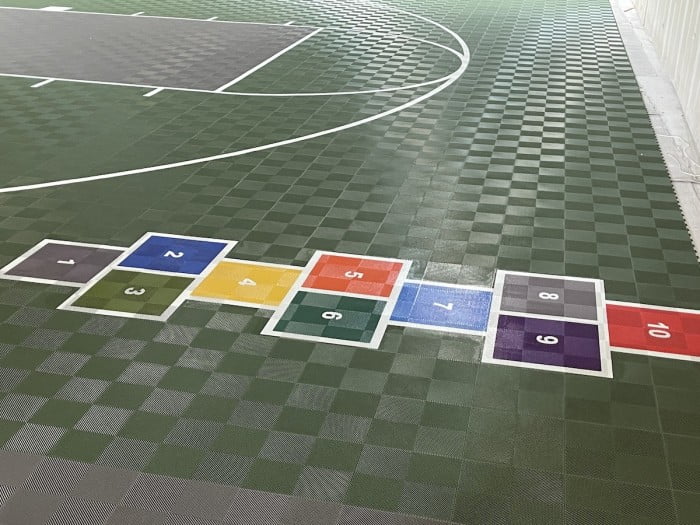 Hopstoch on basketball court floor