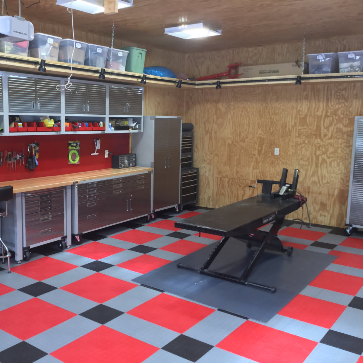 Garage/workshop re model using our Diamond black, gray and red tiles.