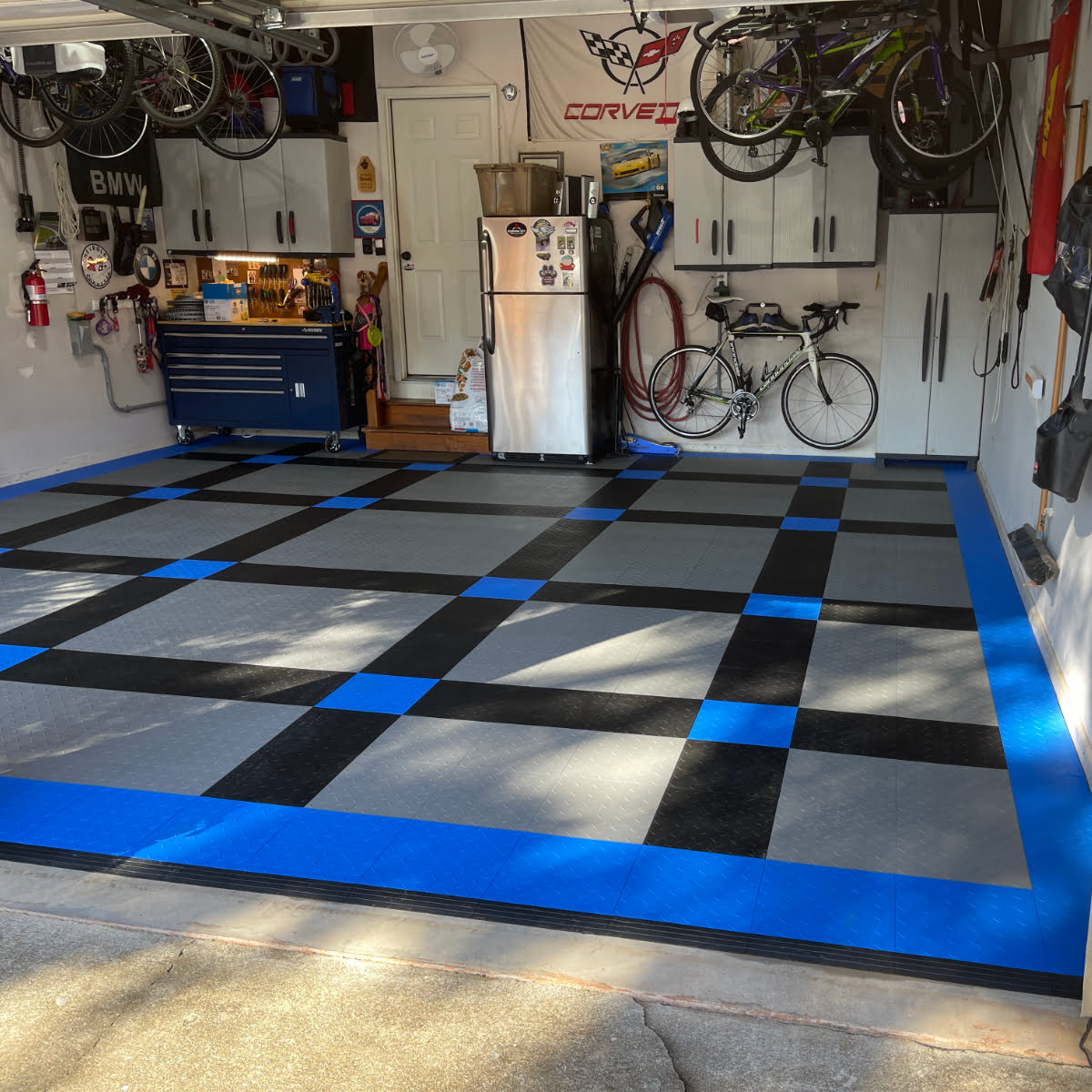 Diamond blue, black and gray patterned garage floor.