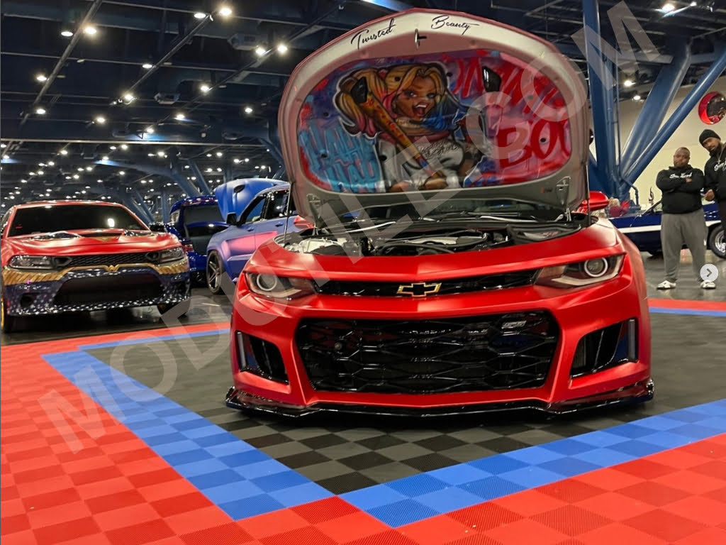 Camaro at the autorama car show with ModuTile Perforated red, blue and black tiles